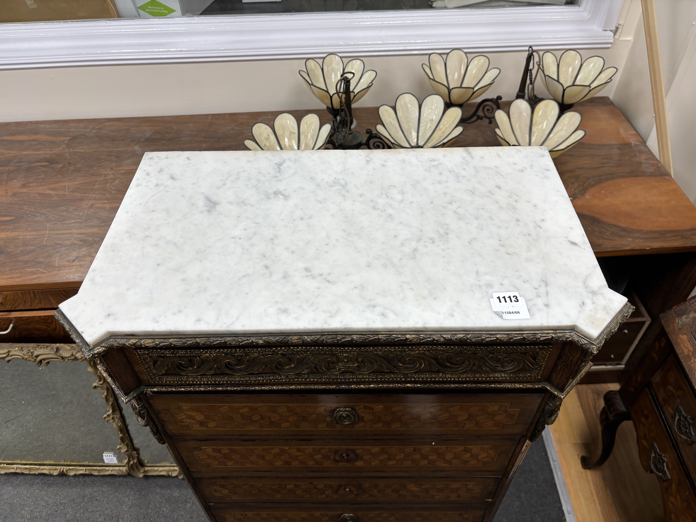 A 19th century French Transitional style parquetry inlaid semanier, gilt metal mounted with white marble top, width 70cm, depth 38cm, height 128cm